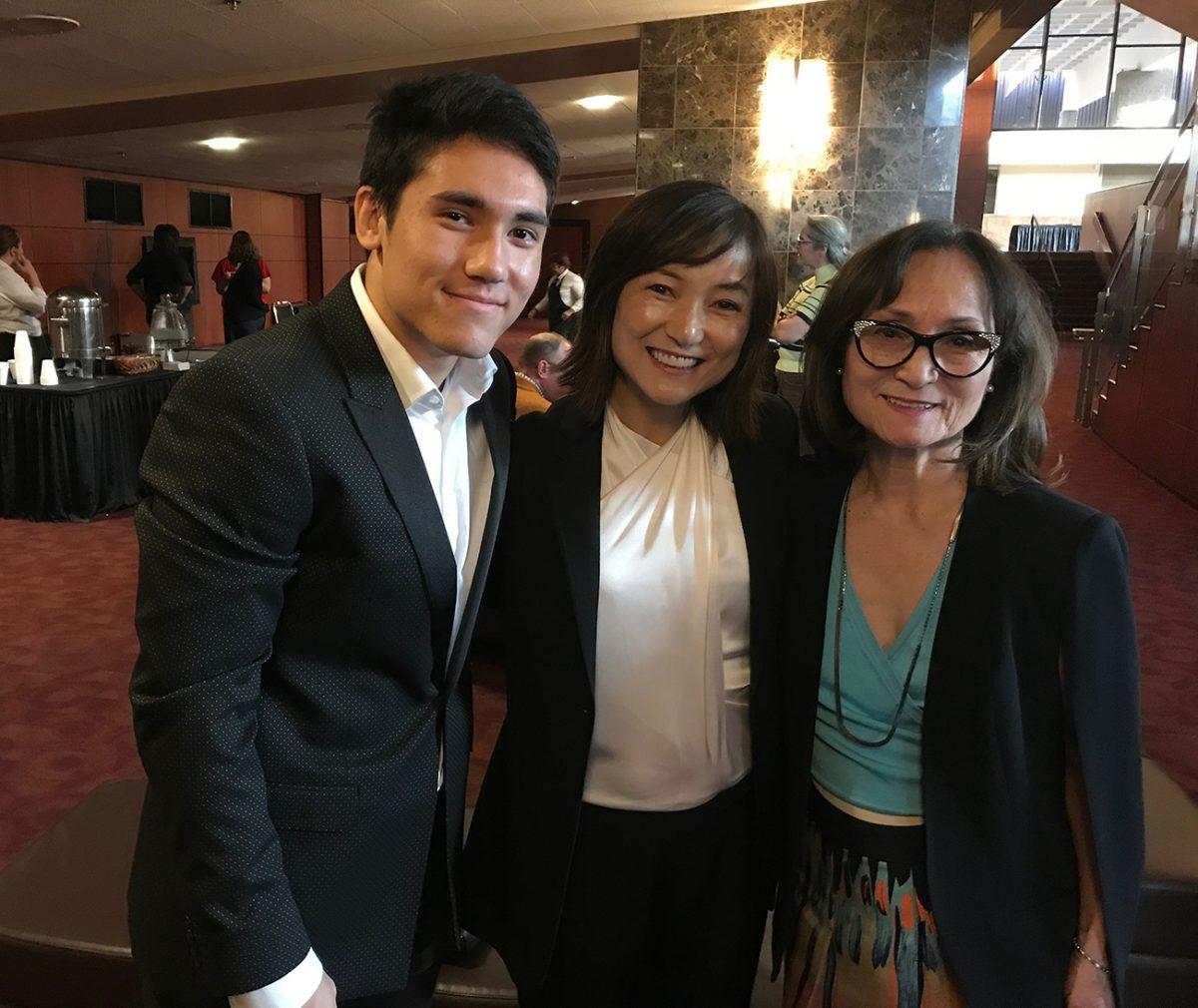 Three generations: Rei Hotoda, center, with her son, Constantine Janello, and mother, Sachiko Hotoda, in the Saroyan Theatre lobby after the conductor's first concert as Fresno Philharmonic music director. Photo / The Munro Review