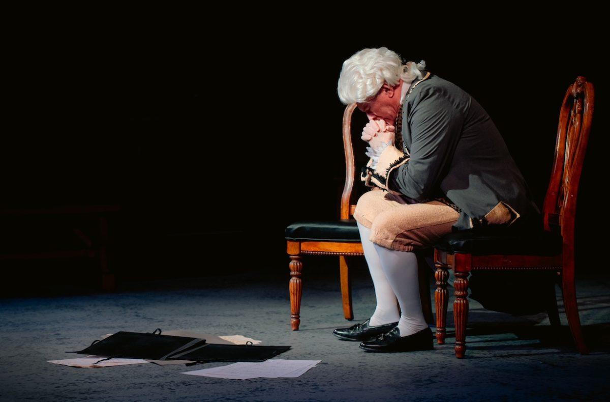 Mark Standriff portrays Salieri in a pensive pose in the play Amadeus