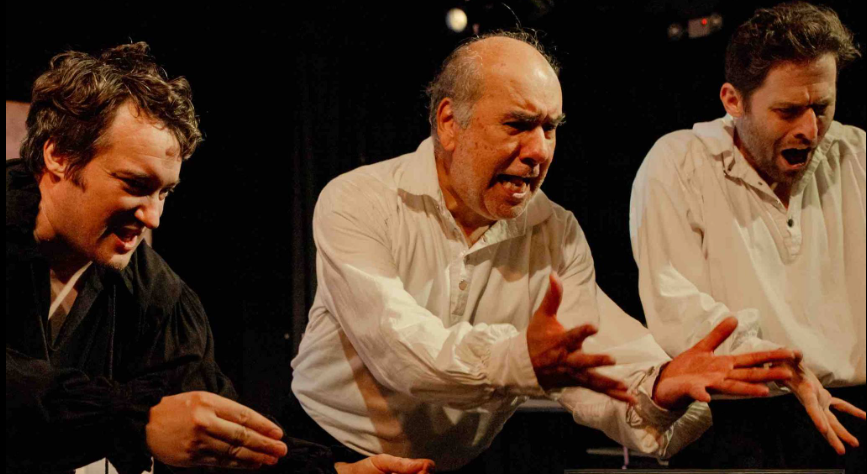 Alex Vaux, Henry Montelongo, and Michael Fidgalgo perform